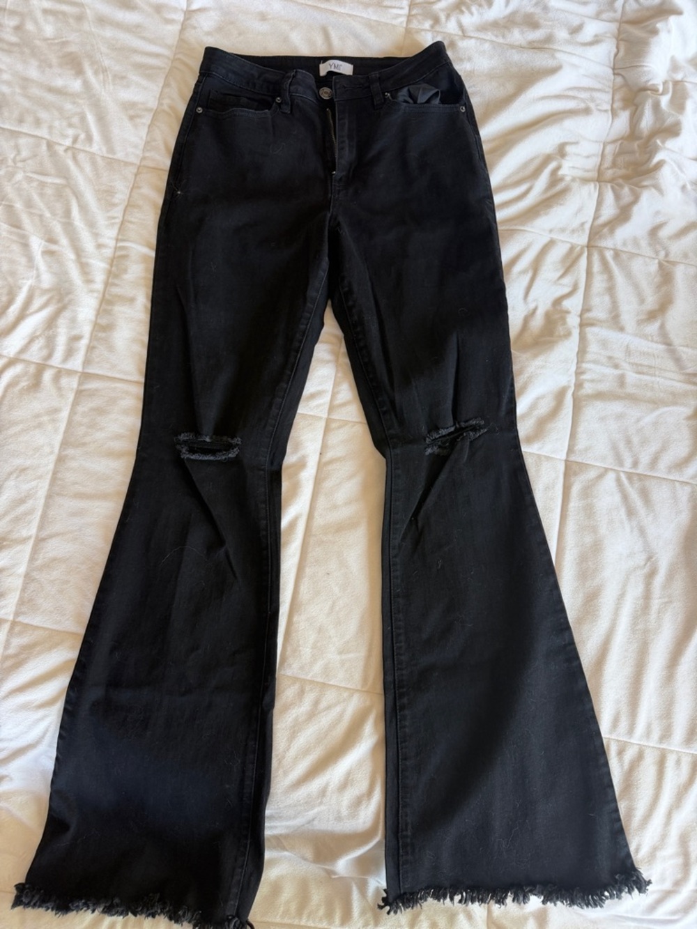Black Flared Jeans with Raw Hem